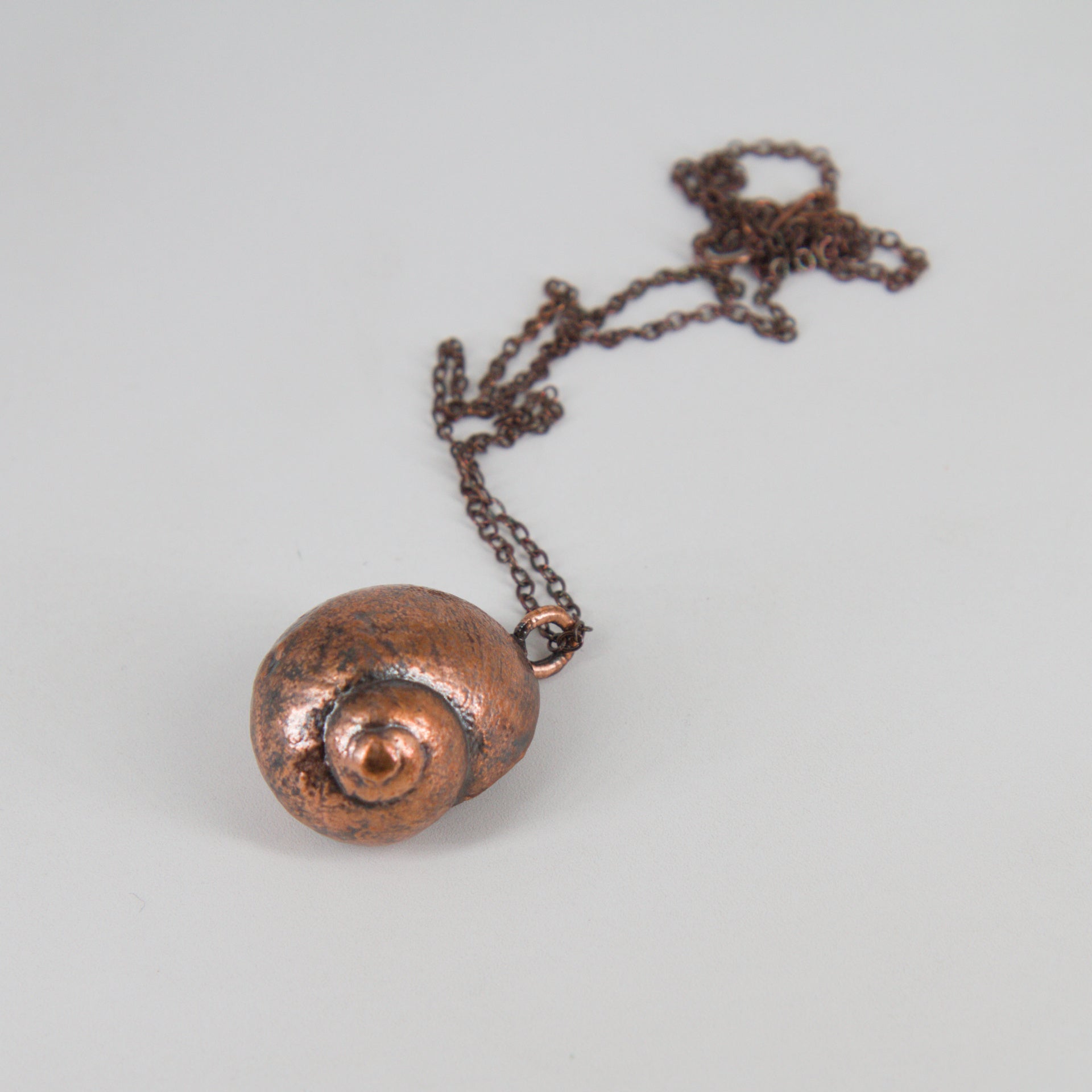 24 - Colgante caracol