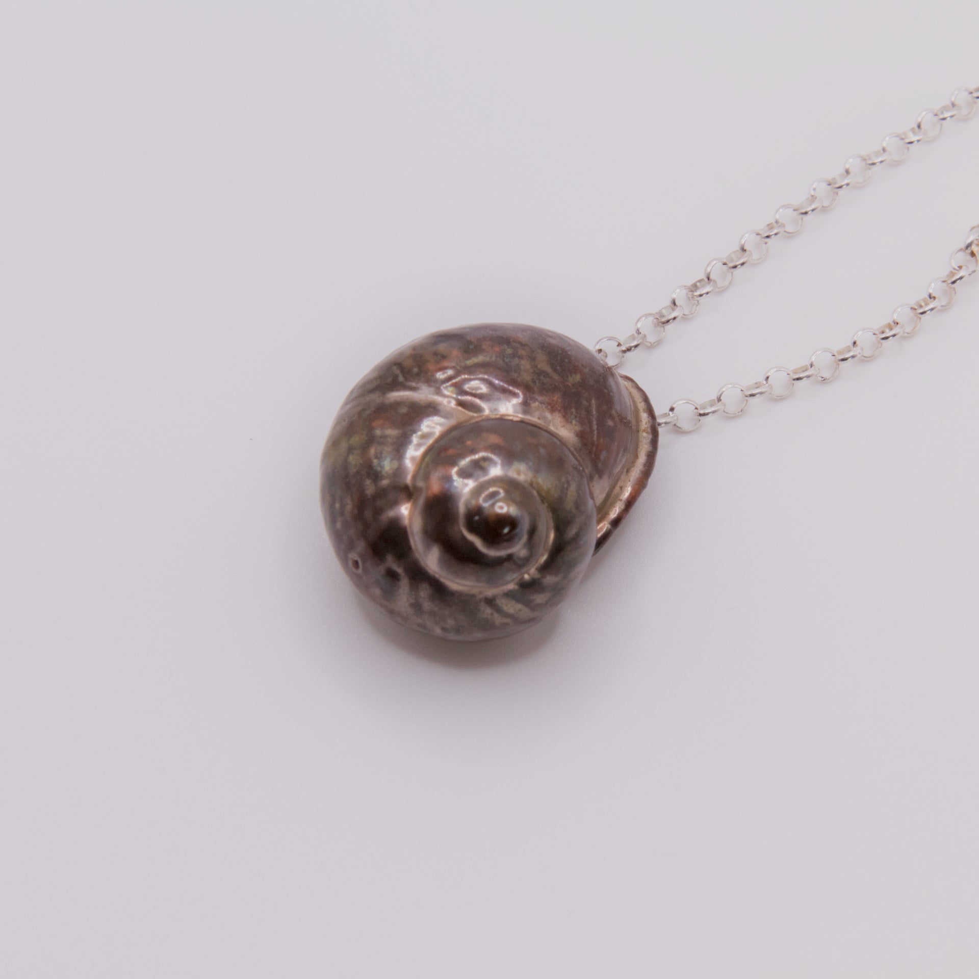 Colgante caracol plata cobre