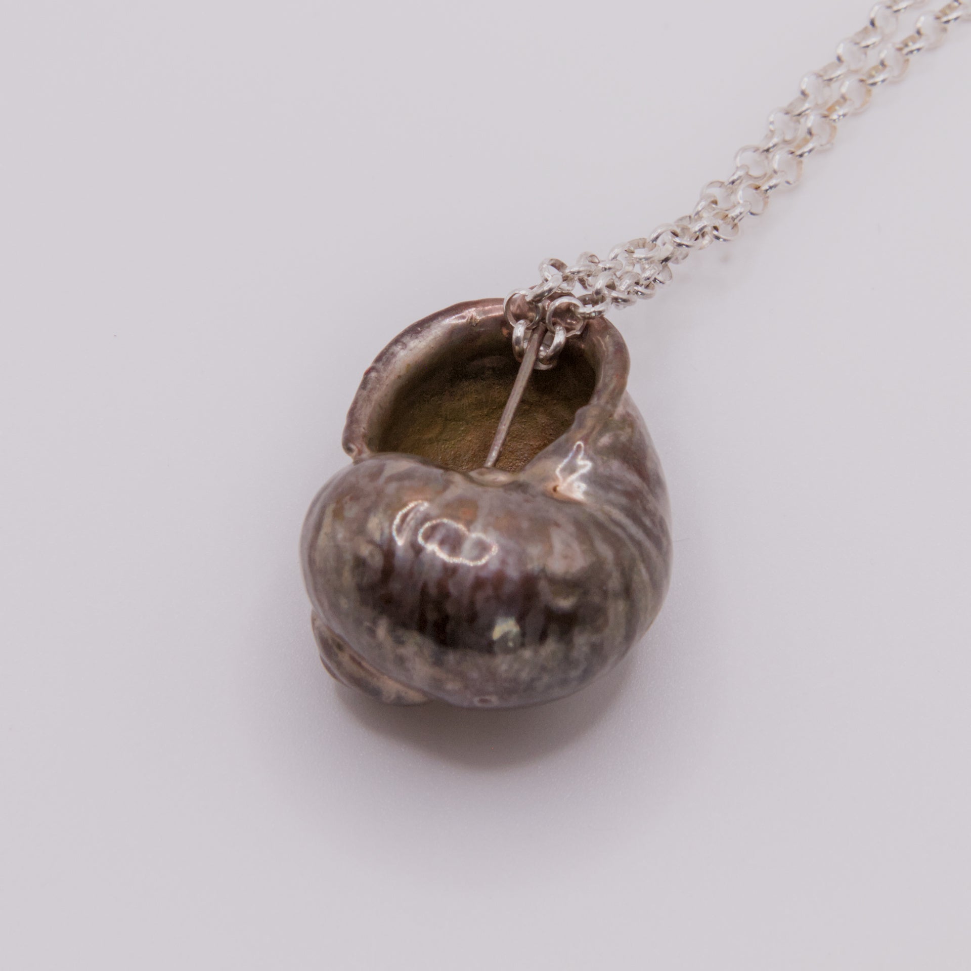 Colgante caracol plata cobre