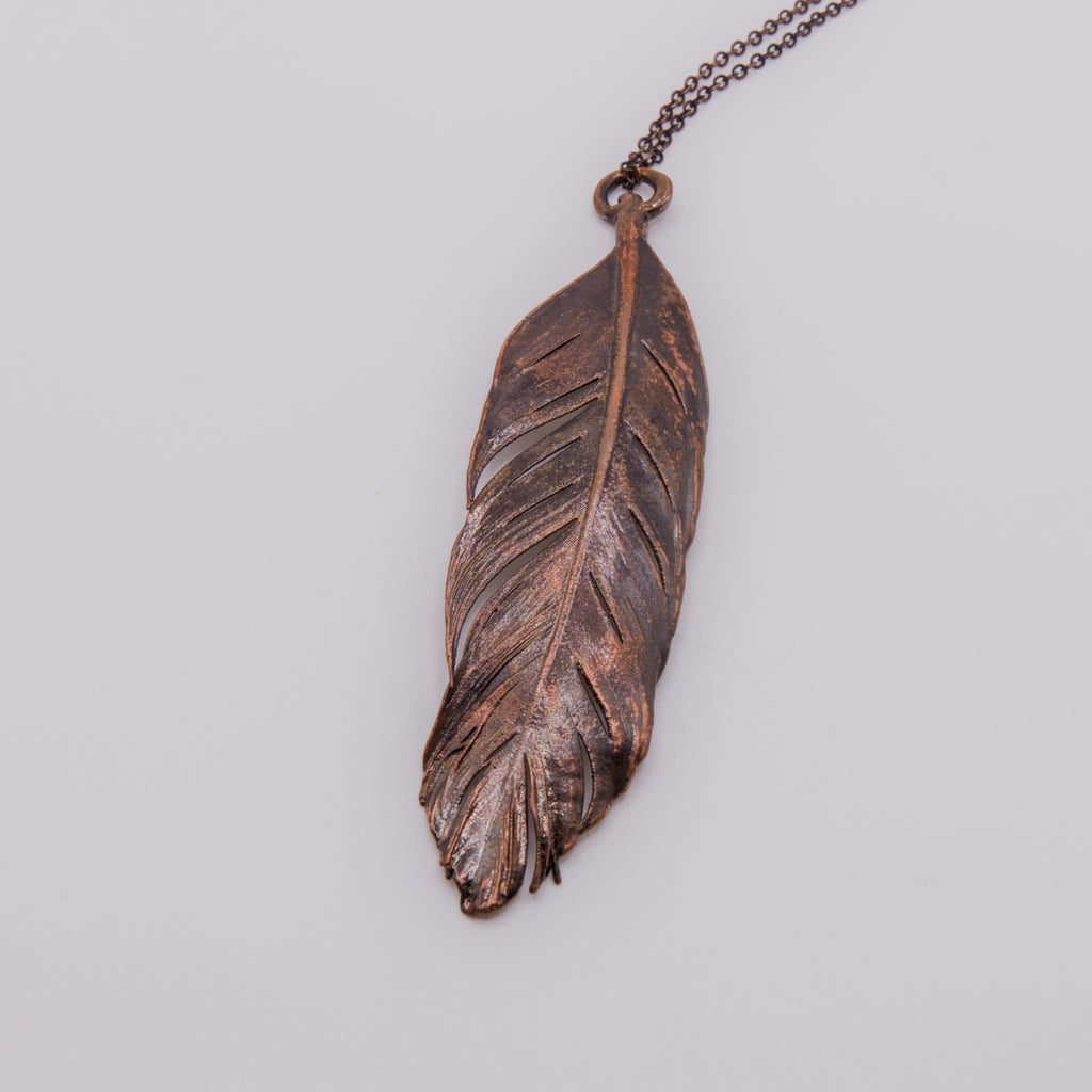 Colgante pluma gallina cobre