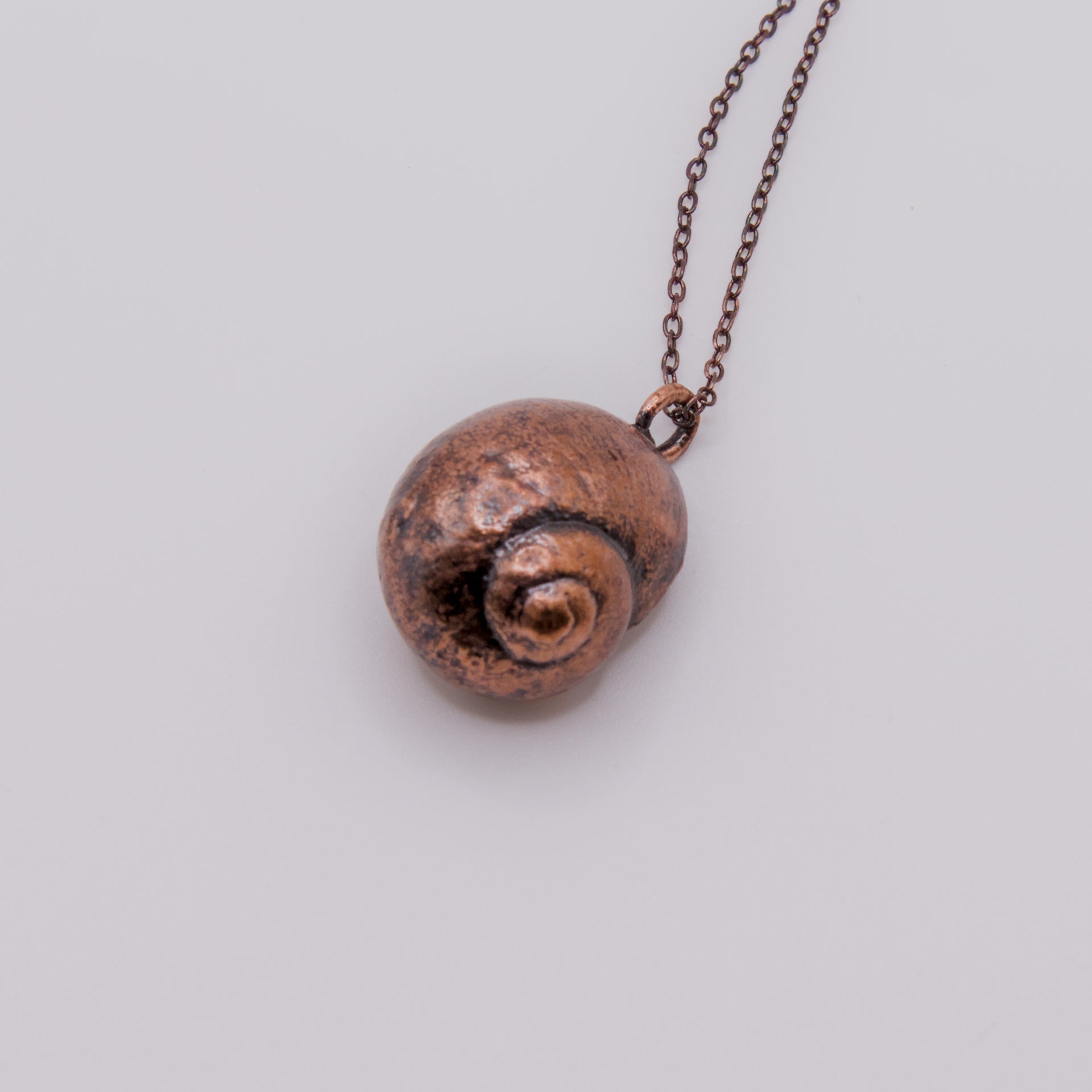 Colgante Caracol cobre